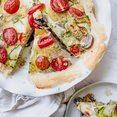 Garden tomato quiche in glass pan with cottage cheese