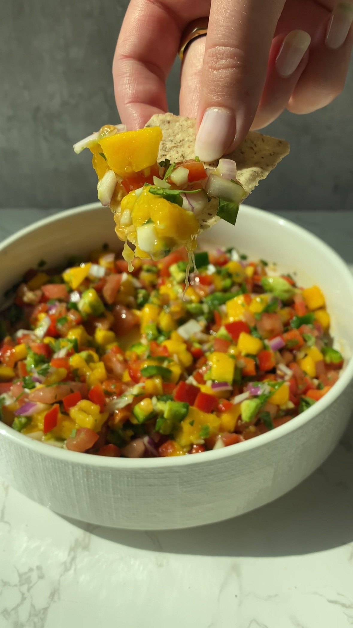 Spicy mango pico de gallo with chip