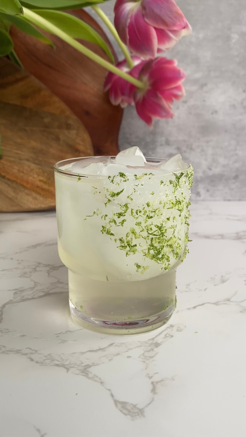 Mineral mocktail with ice and a salted rim