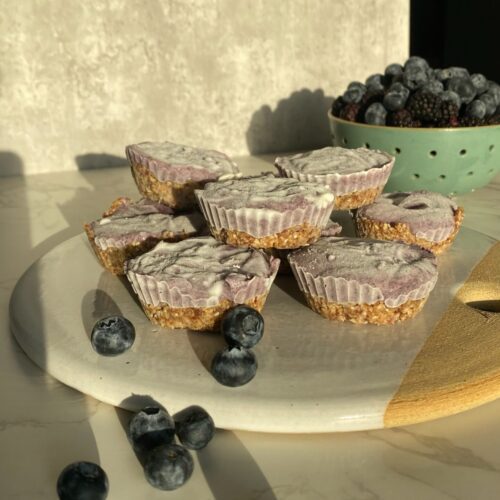 Blueberry greek yogurt breakfast tarts on a marble cutting board