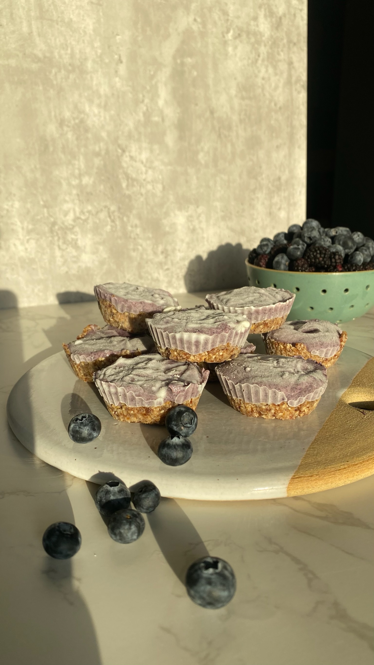 Blueberry greek yogurt breakfast tarts on a marble cutting board